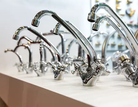 Image showing a bunch of faucets on a counter